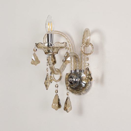Wall light with champagne glass frame and crystal accents displayed on a white background for clear product detailing.
