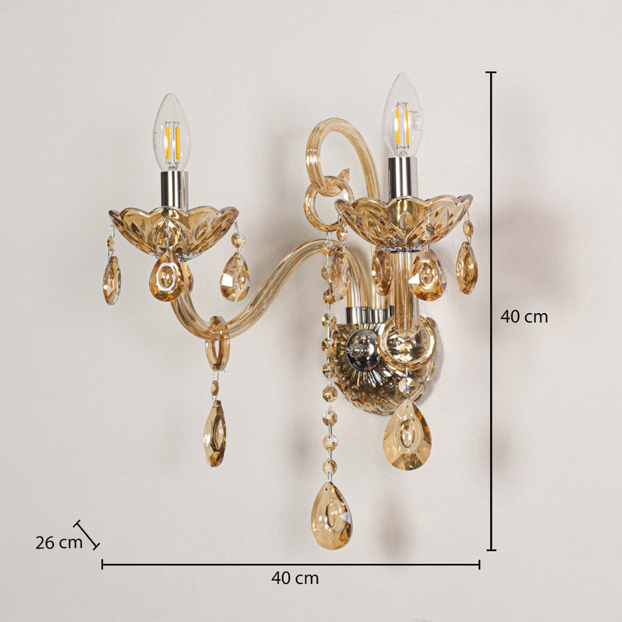Golden crystal dual arm wall light sized 40 cm height and 40 cm width with 26 cm depth ideal for elegant home wall lighting.