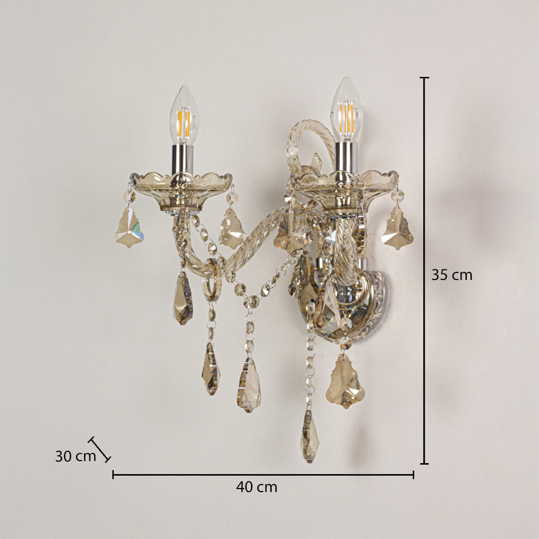 Wall light with champagne glass frame and crystal droplets shown with 35 cm height and 40 cm width and 30 cm depth for accurate placement.