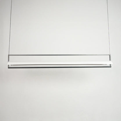 Contemporary linear pendant light with slim bar design suspended in minimal space perfect for stylish home decor lighting.