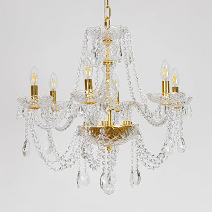 Gold metal crystal chandelier displayed on white background ideal for classic bright interior ceiling styling.