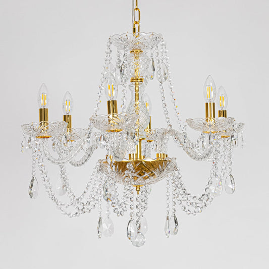 Gold metal crystal chandelier displayed on white background ideal for classic bright interior ceiling styling.