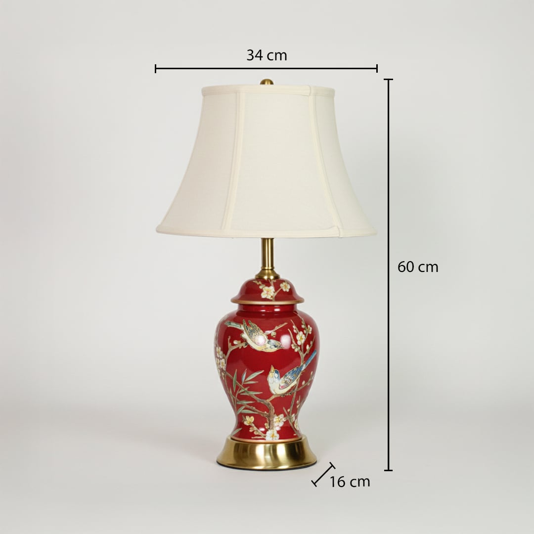 Red ceramic table lamp showing 60 cm height 34 cm shade width and 16 cm base size ideal for bedside or side table use.