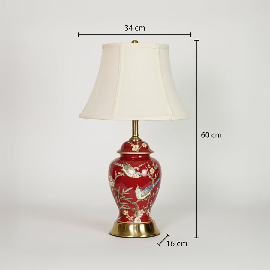 Red ceramic table lamp showing 60 cm height 34 cm shade width and 16 cm base size ideal for bedside or side table use.