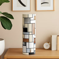 Modern white sculptural ceramic vase styled in a soft minimal room setting adding artistic elegance to contemporary home decor.