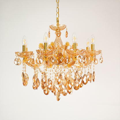 White background image of large venetian crystal chandelier for elegant dining room decor styling with unlit crystal arms.