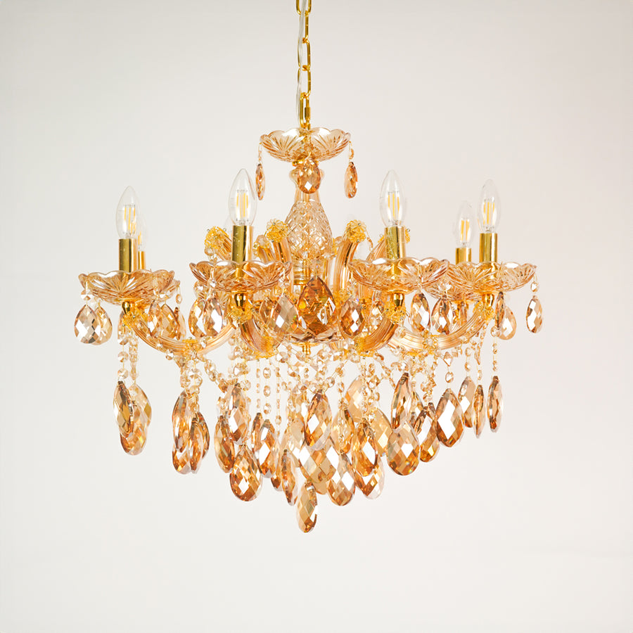 White background image of large venetian crystal chandelier for elegant dining room decor styling with unlit crystal arms.