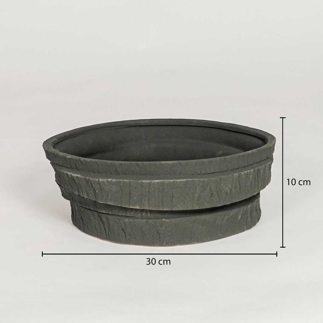 Black ceramic decorative serving bowl showing 30 cm diameter and 10 cm height ideal for dining table centerpiece and kitchen decor display.
