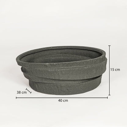 Black ceramic decorative serving bowl showing 40 cm length 38 cm width and 15 cm height ideal for dining table centerpiece decor.