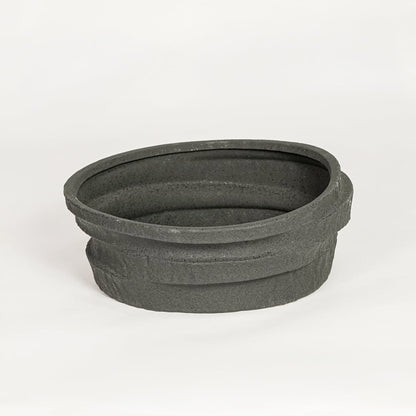 Modern black ceramic decorative serving bowl ideal for fruit display on dining table centerpiece and stylish home decor.