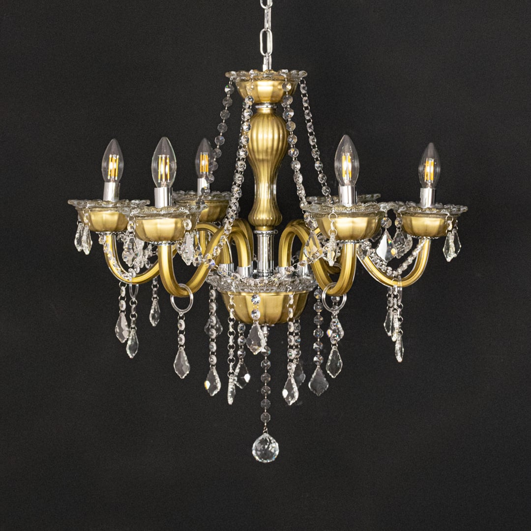Vintage gold metal crystal chandelier shown on black background highlighting rich ornate details for premium home decor.