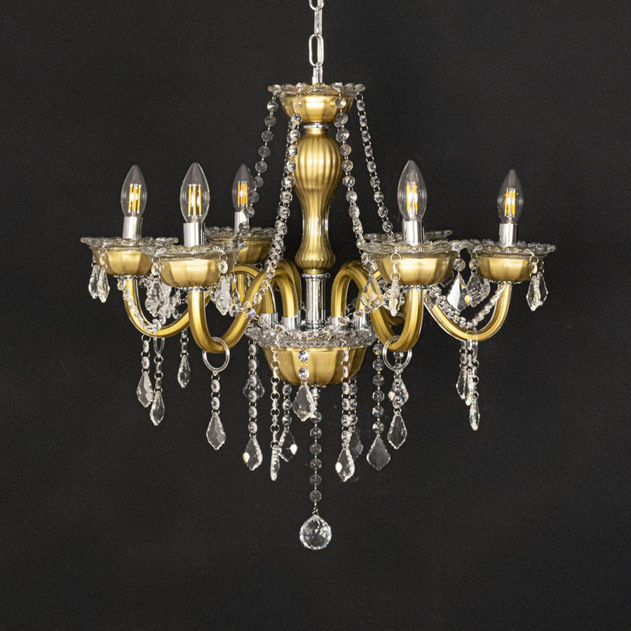 Vintage gold metal crystal chandelier shown on black background highlighting rich ornate details for premium home decor.