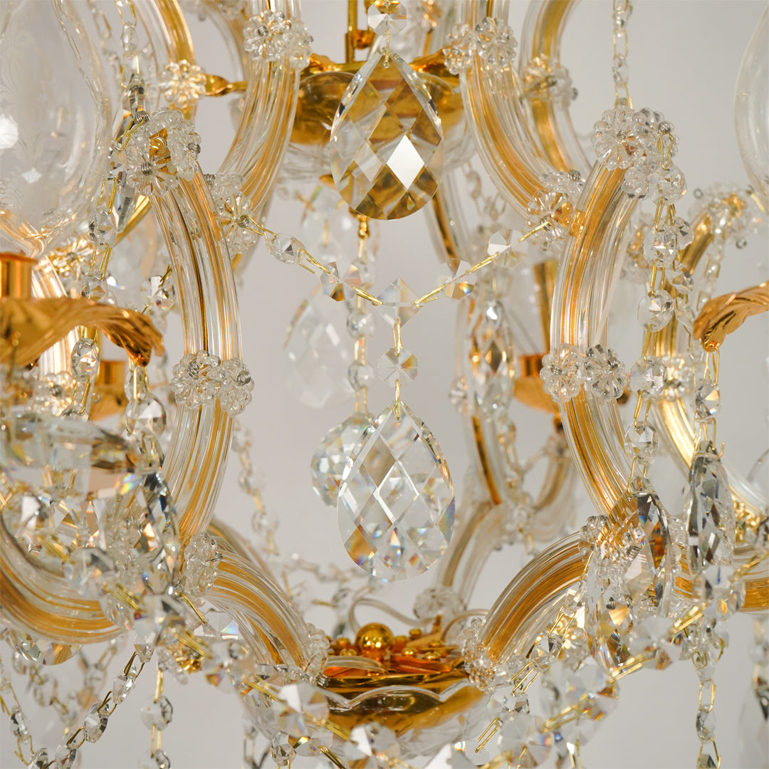 Closeup image of antique style clear glass chandelier for luxury living room decor styling with beautiful glass details.
