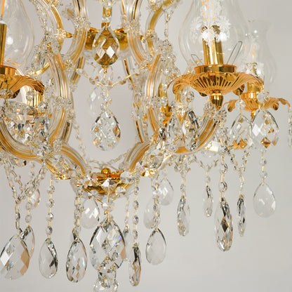Closeup image of antique style clear glass chandelier for elegant living room decor styling with elegant glass accents.