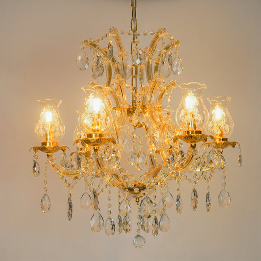 White background image of antique style clear glass chandelier for modern living room decor styling with bright lighting.