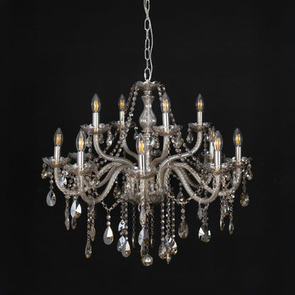 Chandelier with golden crystal detailing displayed off against black background for modern decorative style.