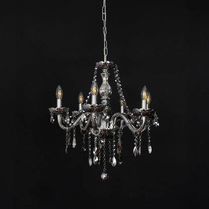 Grey chandelier with crystal accents displayed off against black background for modern luxury decorative style.