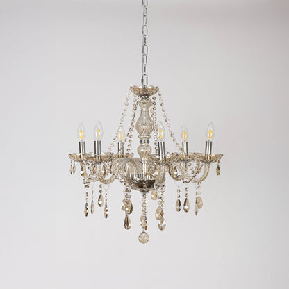 Classic golden chandelier with crystal accents displayed off on white background for stylish decorative lighting.
