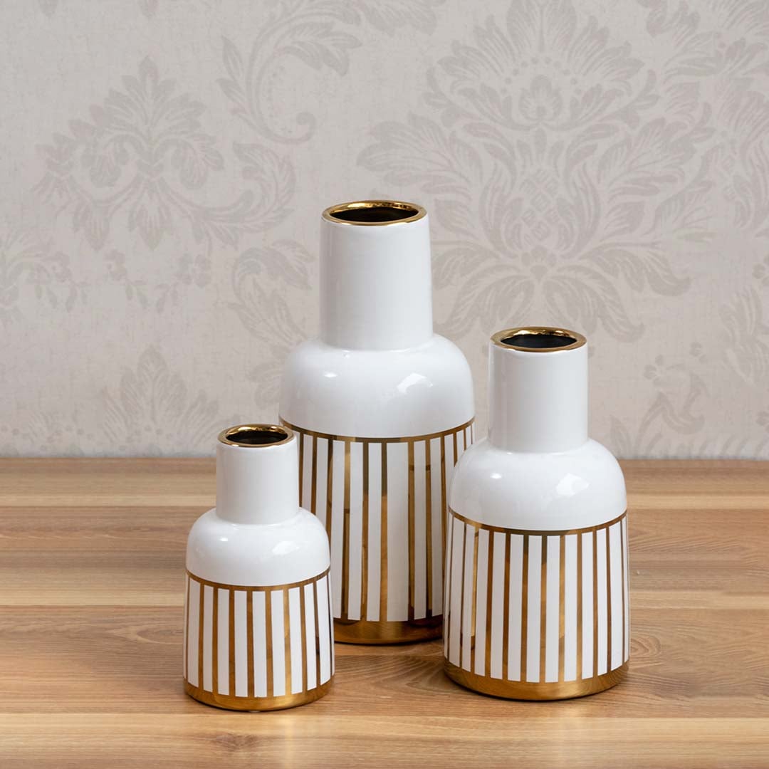 White ceramic decorative vase set with gold ribbed base for tabletop shelf living room or office display with modern style.