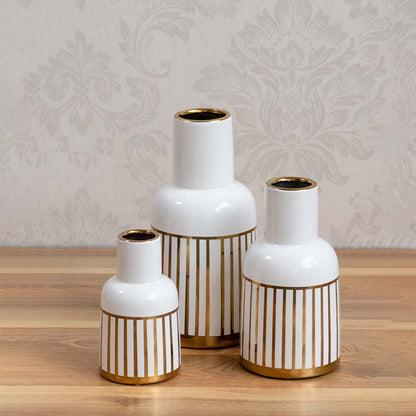 White ceramic decorative vase set with gold ribbed base for tabletop shelf living room or office display with modern style.