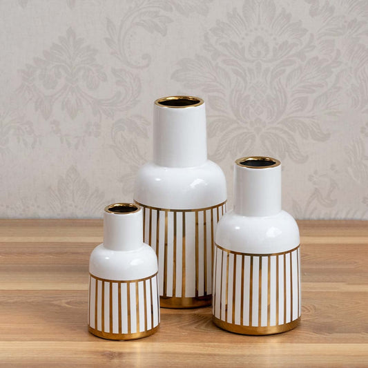 White ceramic decorative vase set with gold ribbed base for tabletop shelf living room or office display with modern style.