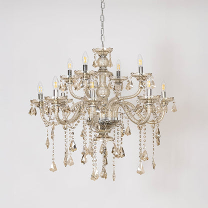 Chandelier with lights off showing crystal hanging design and detailed glass body on plain white background.