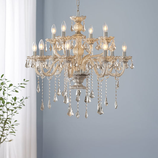 Crystal chandelier glowing warmly in modern living room with blue wall and white curtains for elegant ceiling decor.