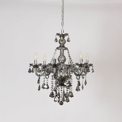 Classic chandelier with lights off on white background showing detailed crystal and metal design.