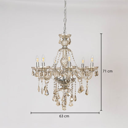 Golden chandelier with crystal accents shown with 63 cm width and 71 cm height for decorative lighting.