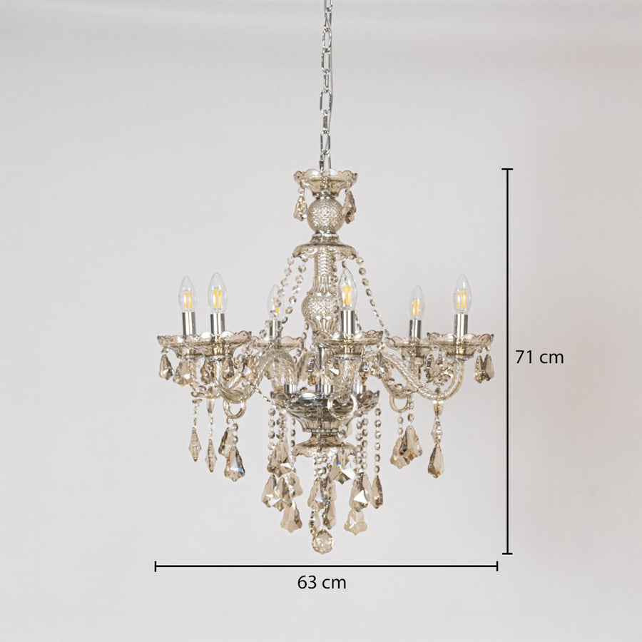 Golden chandelier with crystal accents shown with 63 cm width and 71 cm height for decorative lighting.
