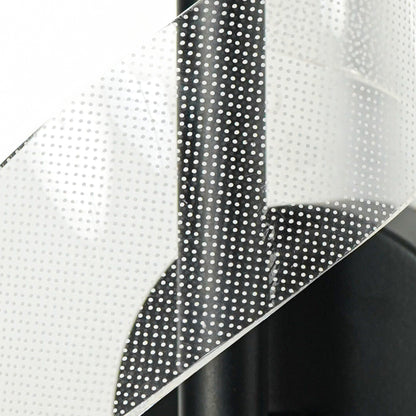 Closeup of black metal and translucent mesh wall light for premium modern decor styling spaces.