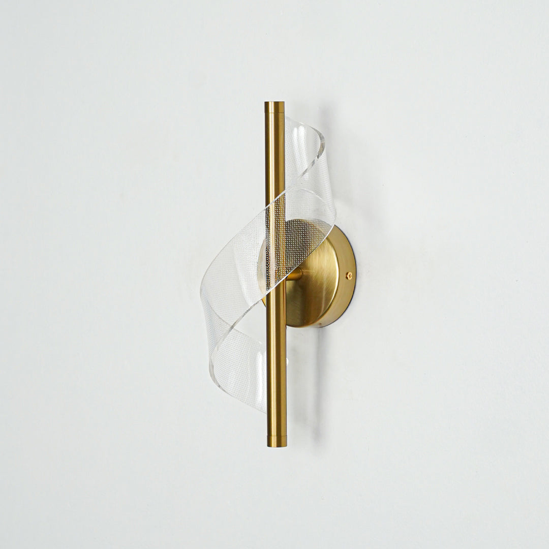 Modern gold metal wall light with decorative mesh detail for stylish bedroom and luxury decor spaces.

