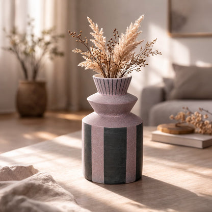 Contemporary ceramic flower vase in muted grey pink and green shades styled for living room shelf or bedside table decor.
