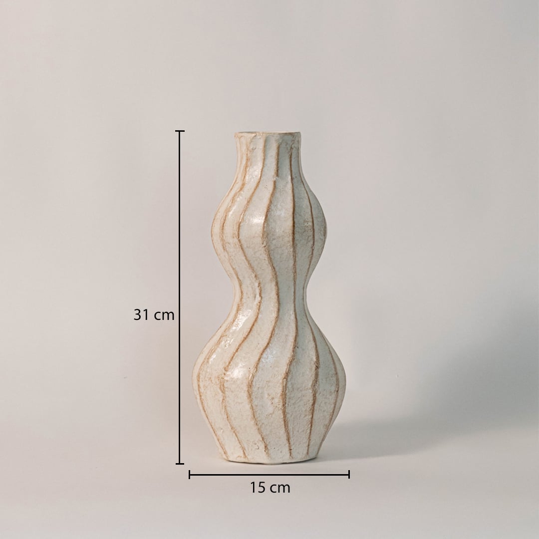 Wavy ceramic vase measuring 31 cm in height and 15 cm in width - ideal as a statement decor piece or flower vase.