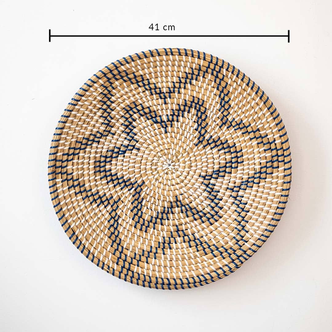 Beautiful star geometric patterned black and beige woven seagrass wall basket plate featuring a size line indicator.