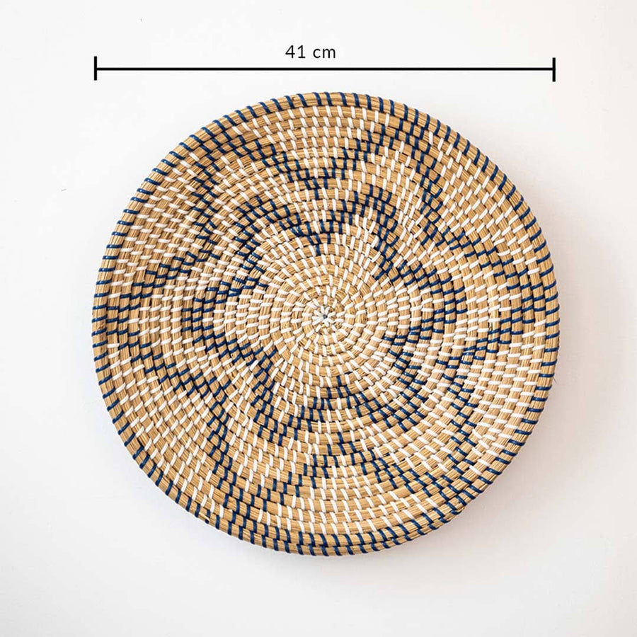 Beautiful star geometric patterned black and beige woven seagrass wall basket plate featuring a size line indicator.