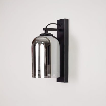 Modern black metal wall light with smoked glass shade for stylish bedroom and hallway decor.