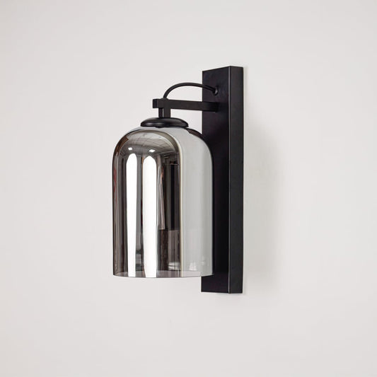 Modern black metal wall light with smoked glass shade for stylish bedroom and hallway decor.