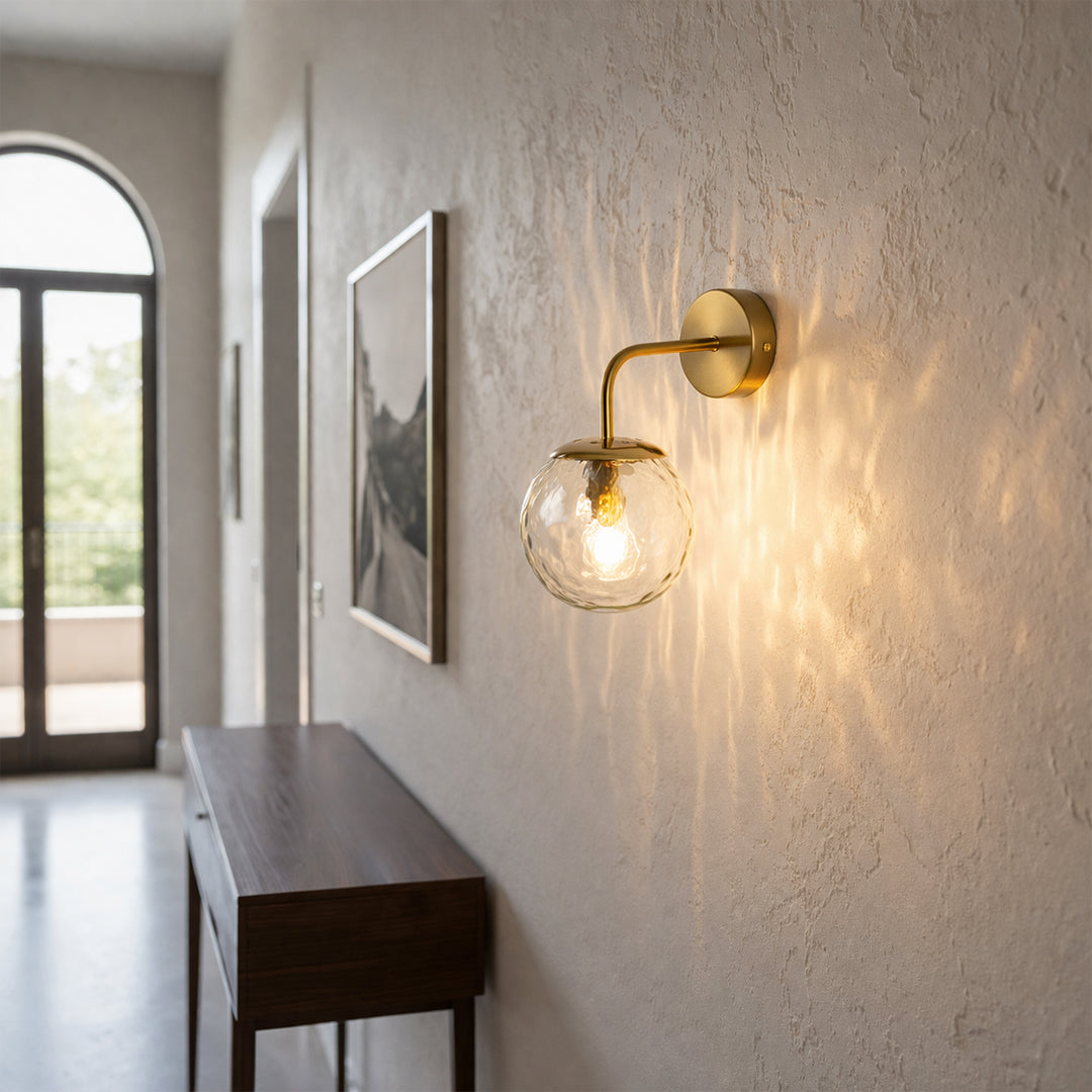 Elegant brass wall light with textured glass glow enhancing modern hallway and bedroom interior ambiance.