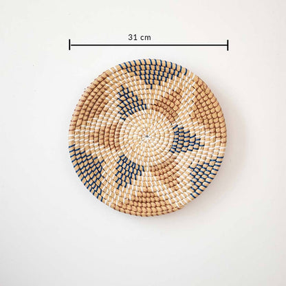 Aztec star geometric patterned black and beige woven seagrass wall hanging basket plate featuring a size line indicator.