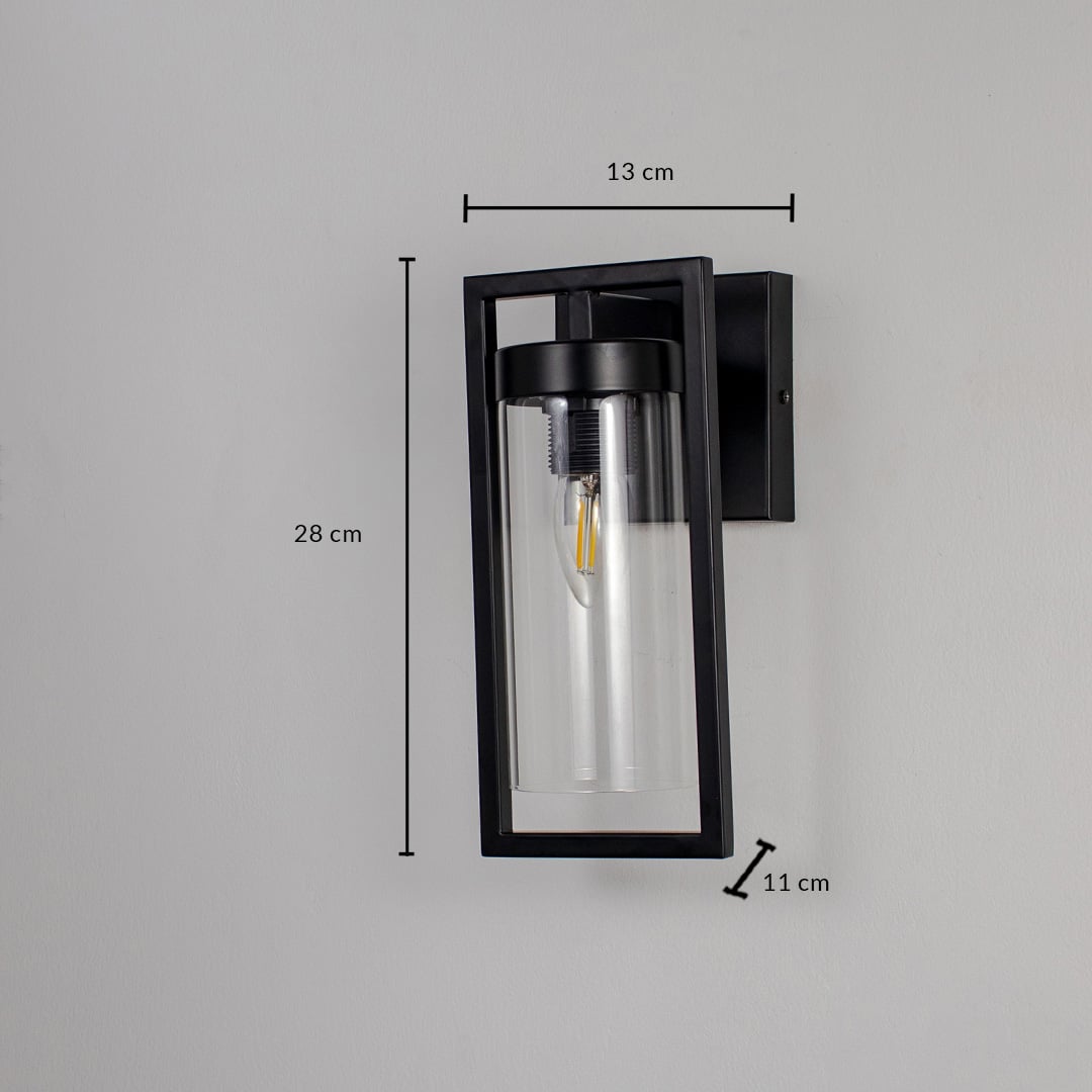 Outdoor wall lantern with black metal frame and clear glass showing 32 cm height 14 cm width and 11 cm projection.
