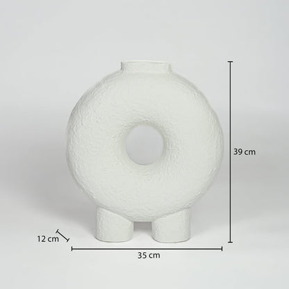 White ceramic donut vase measuring 39 cm height 35 cm width and 12 cm depth ideal for modern console decor styling.