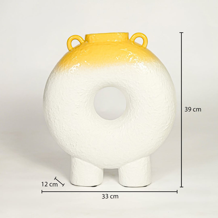 White and yellow ceramic decorative ring vase showing 39 cm height 33 cm width and 12 cm depth suitable for table console or shelf placement.