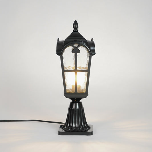 Decorative black outdoor gate light with glowing bulb for stylish exterior decor styling use.