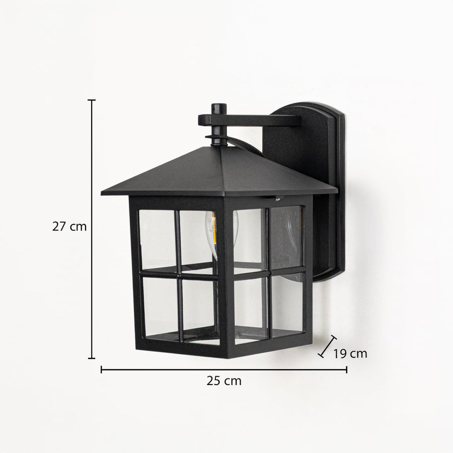 Outdoor wall light with square lantern design black finish and glass panels shown with 27 cm height 25 cm width 19 cm depth.