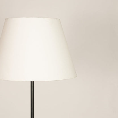 Closeup white fabric tapered shade with smooth finish for soft diffused lighting in modern interior spaces Decor.