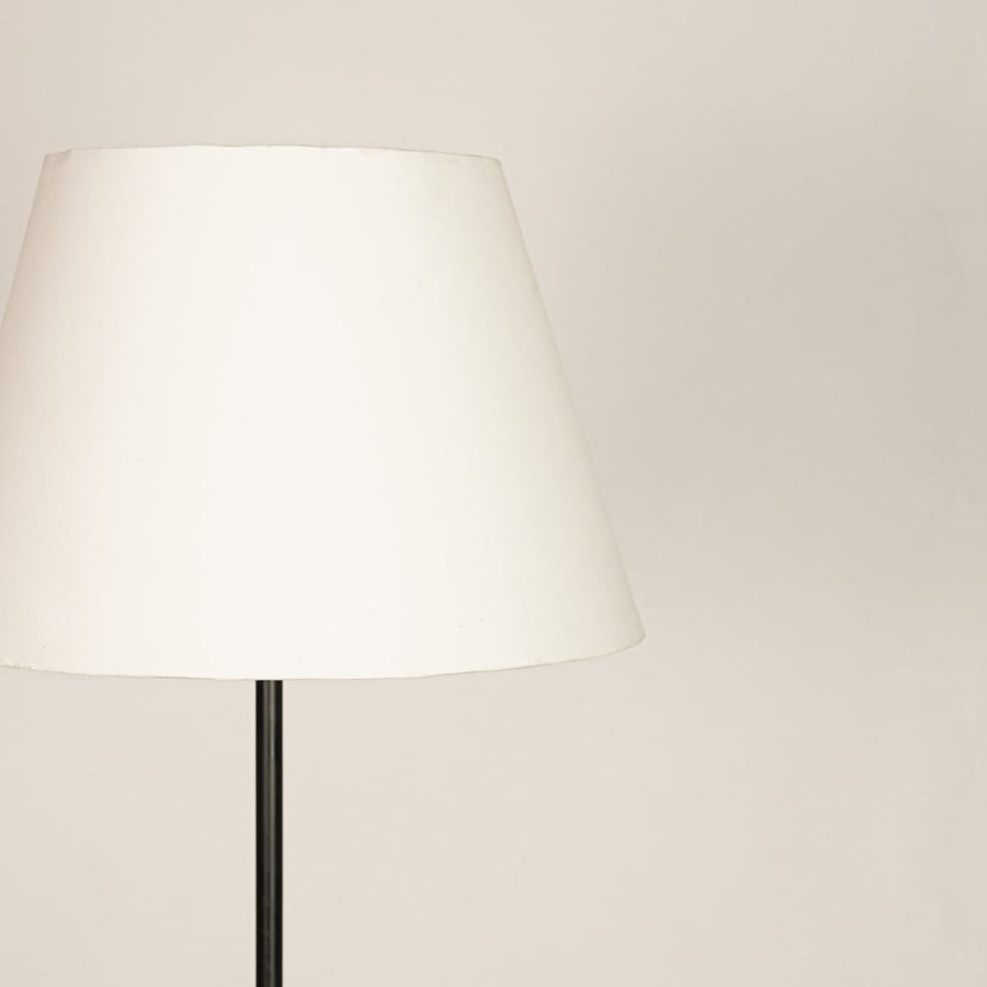 Closeup white fabric tapered shade with smooth finish for soft diffused lighting in modern interior spaces Decor.