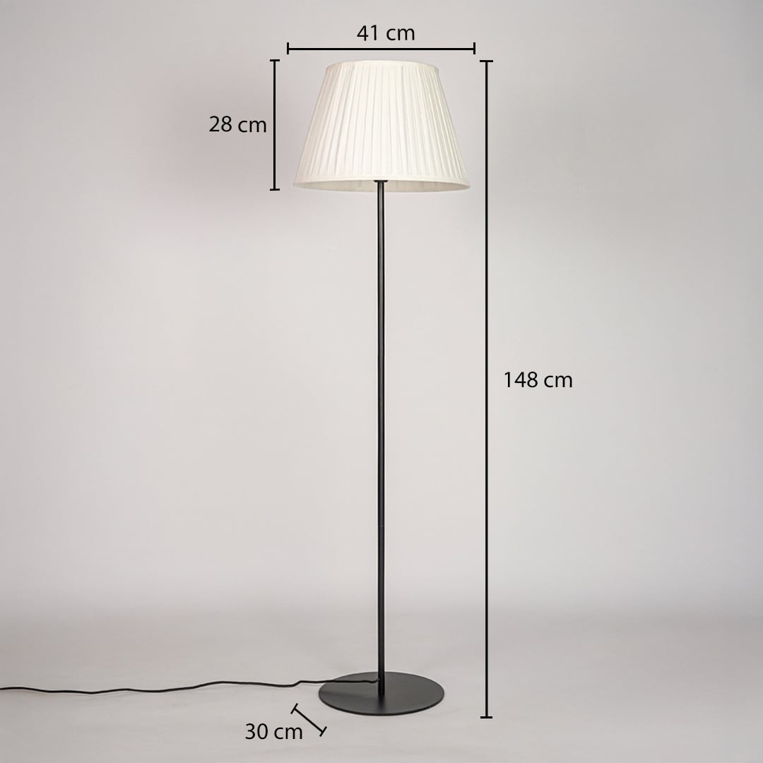 Floor lamp measuring 148 cm height with 41 cm shade width 28 cm shade height and 30 cm round base diameter.