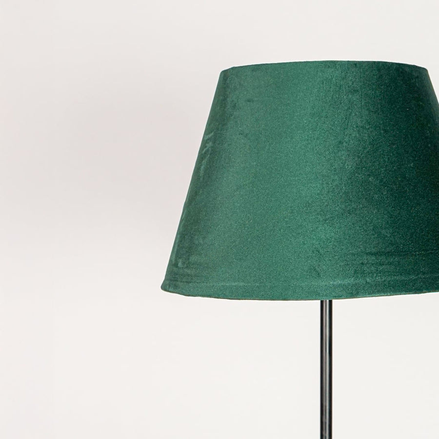Green velvet tapered lampshade with soft textured finish designed for warm ambient lighting effect.