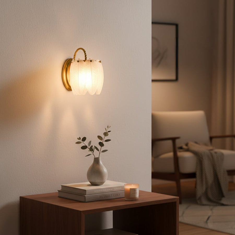 Elegant wall light with soft warm glow styled in a cozy living room setting above a wooden side table creating a calm ambient mood for modern Decor interiors.